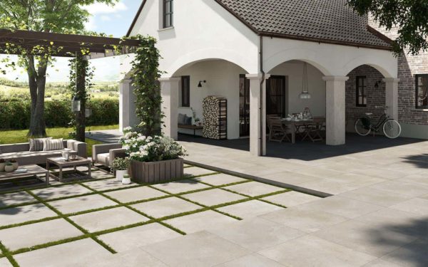 An outdoor patio with Dom Ceramiche Mas de Provence Cloud tile